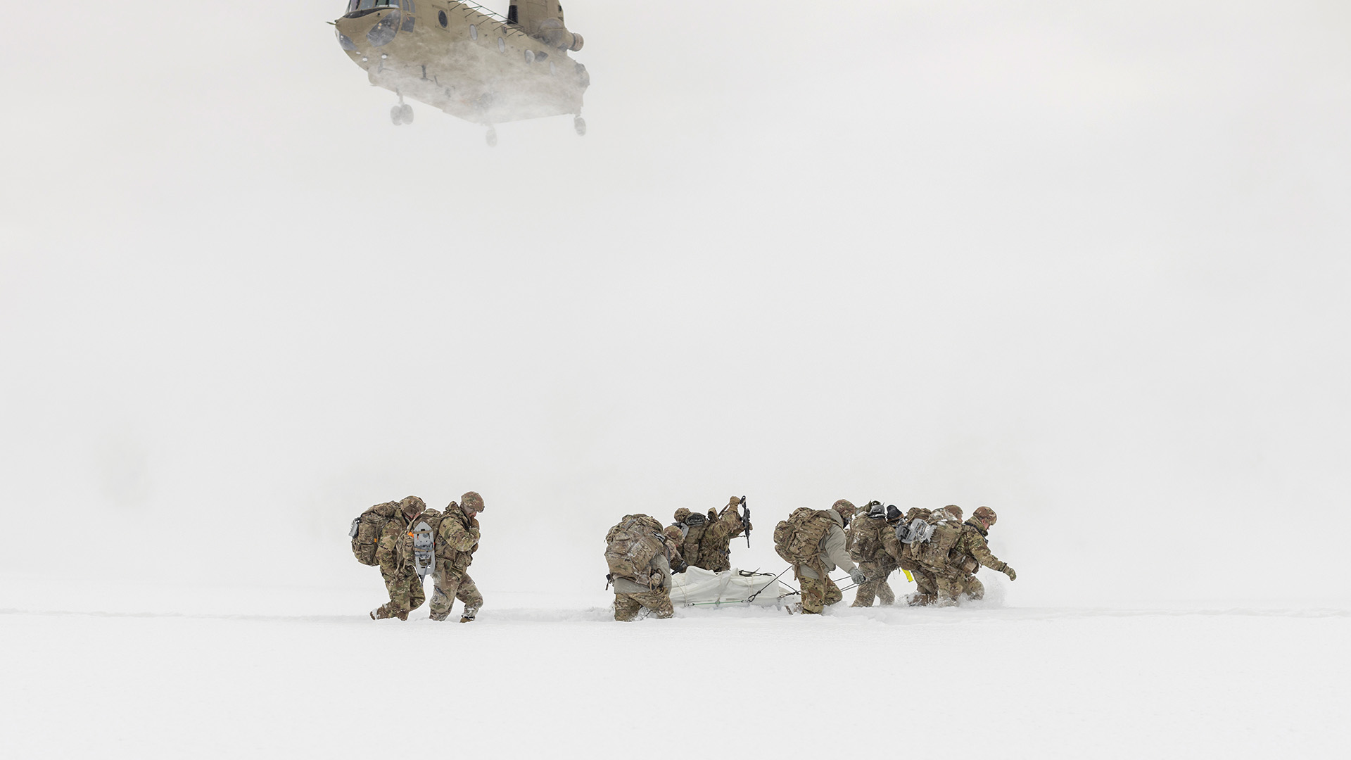 Picture of soldiers walking on snow during a training event 
