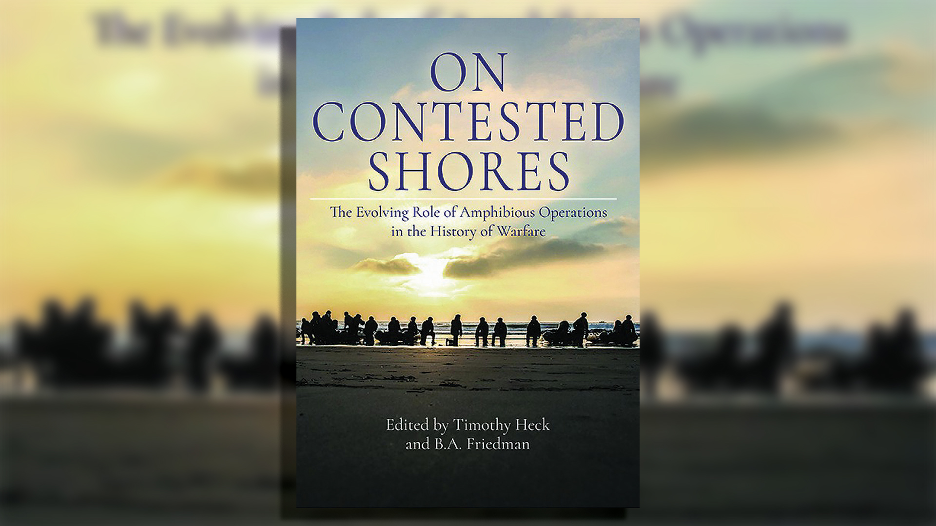 Book cover for 'On Contested Shores: The Evolving Role of Amphibious Operations in the History of Warfare' edited by Timothy Heck and B.A. Friedman, featuring a twilight beach scene with silhouettes of soldiers gathered near the shoreline against a dramatic sky
