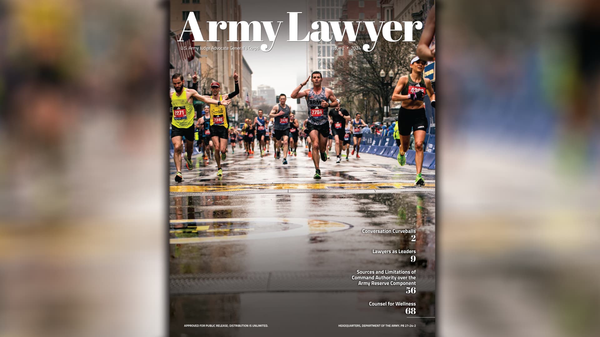 CW2 Norman H. Mininger salutes as he crosses the finish line of the 127th Boston Marathon. (Credit: Boston Athletic Association, Meghan Murphy)