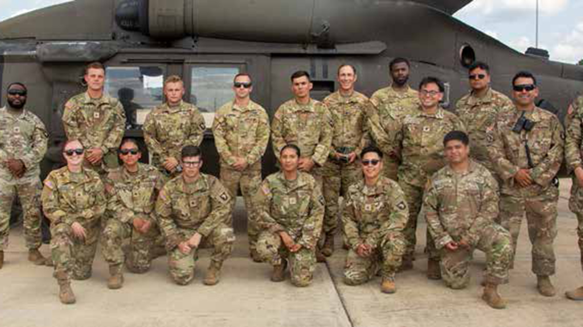 Soldiers from the 101st airborne division pose for a picture as they arrive at their training area