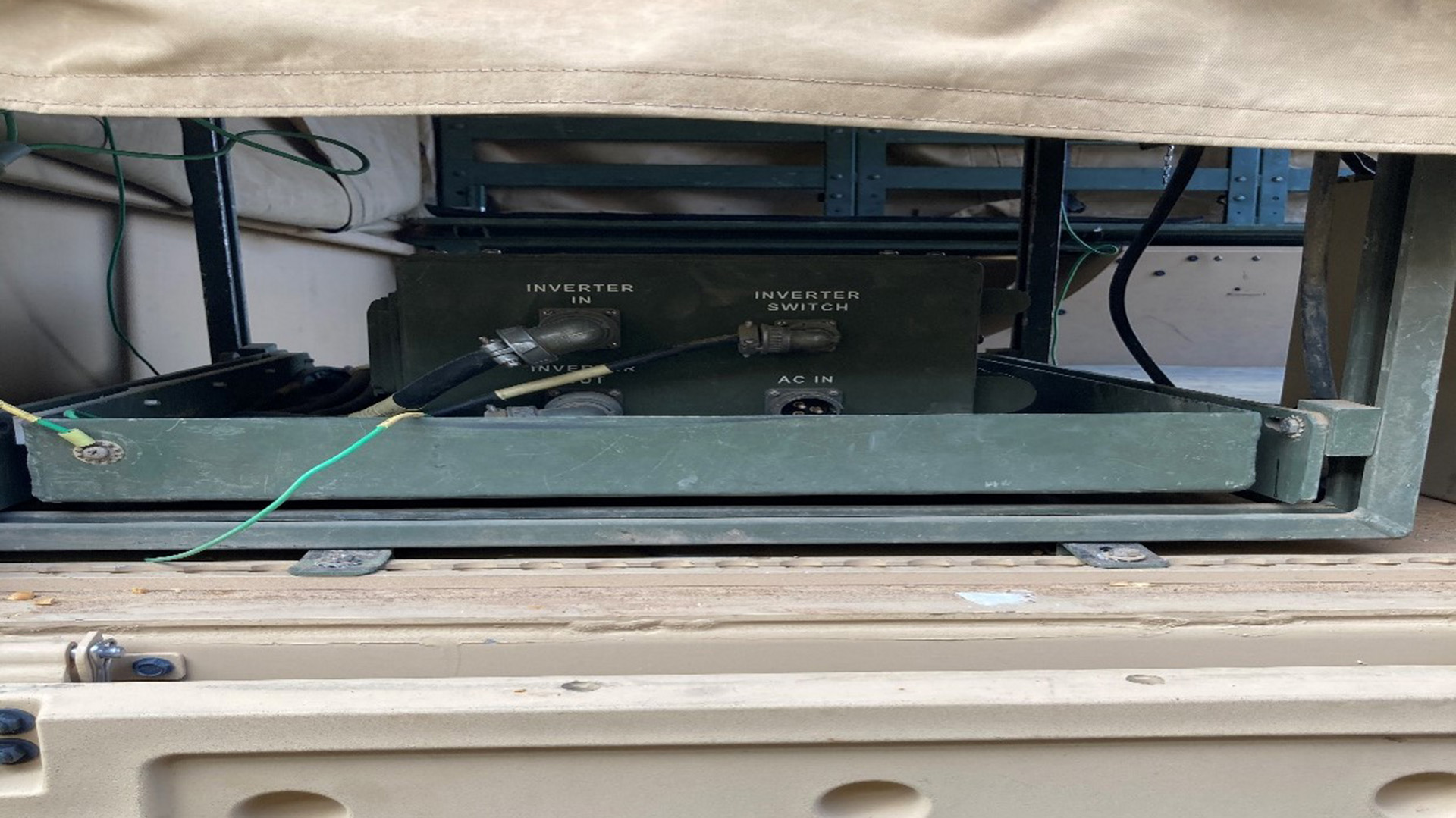 photo 1 of power supply cables  routed from the JLTV to the inverter/converter