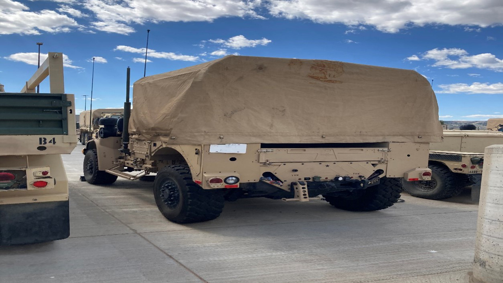 photo of a covered rear portion of a JLTV
