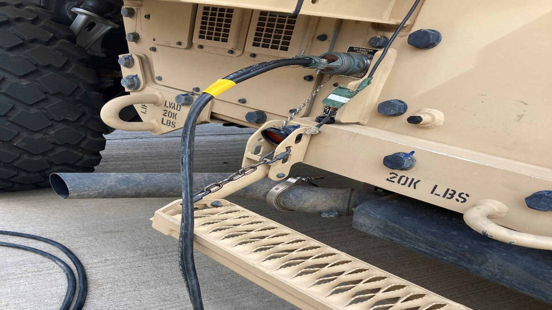 photo of a power cord plugged into a JLTV