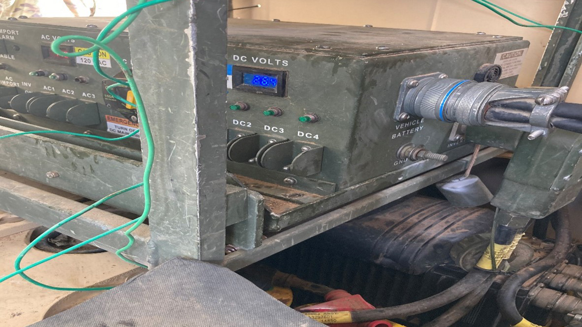photo 8 of the FDC to power 
        all radios and radio mounts from the rear of the 
        JLTV