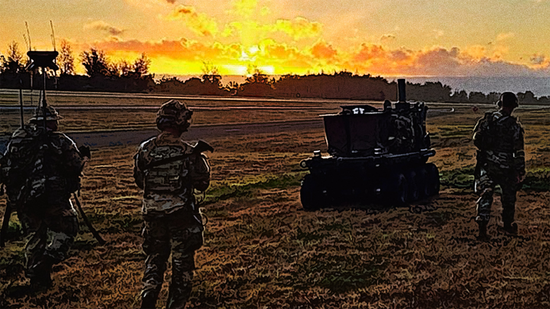 Military personnel in camouflage uniforms operating equipment and vehicles in an open field during a dramatic sunset with bright yellow and orange clouds illuminating the sky