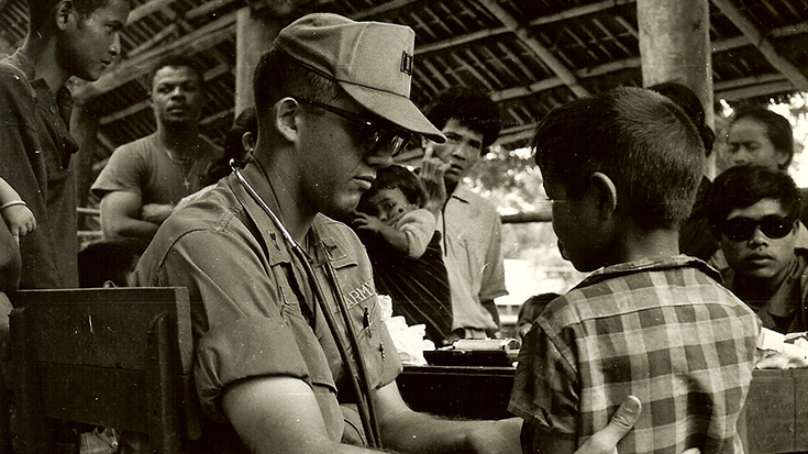 Capt. Blanck conducts a medical exam in Vietnam